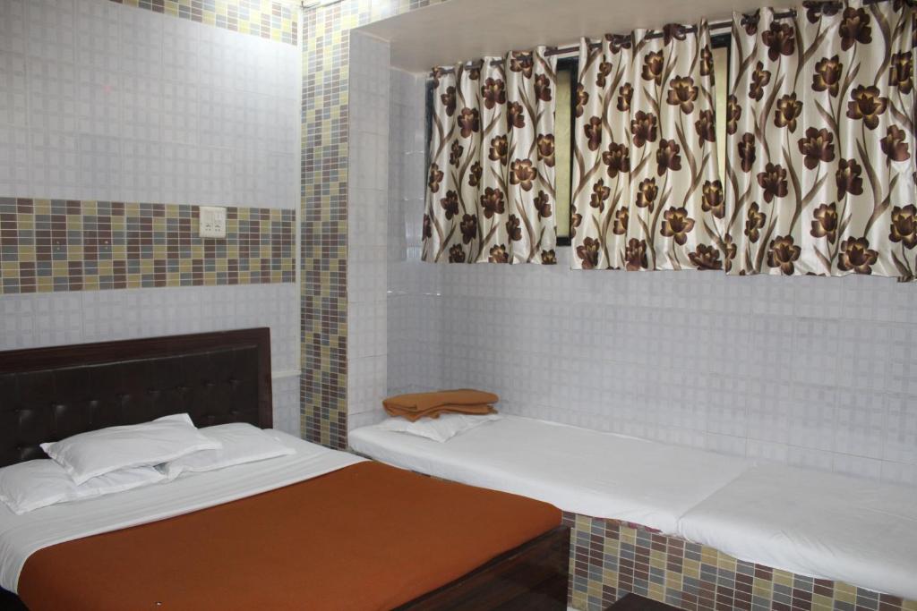 Двухместный (Двухместный номер Делюкс с 1 кроватью) отеля Hotel Sea Sands, Мумбай