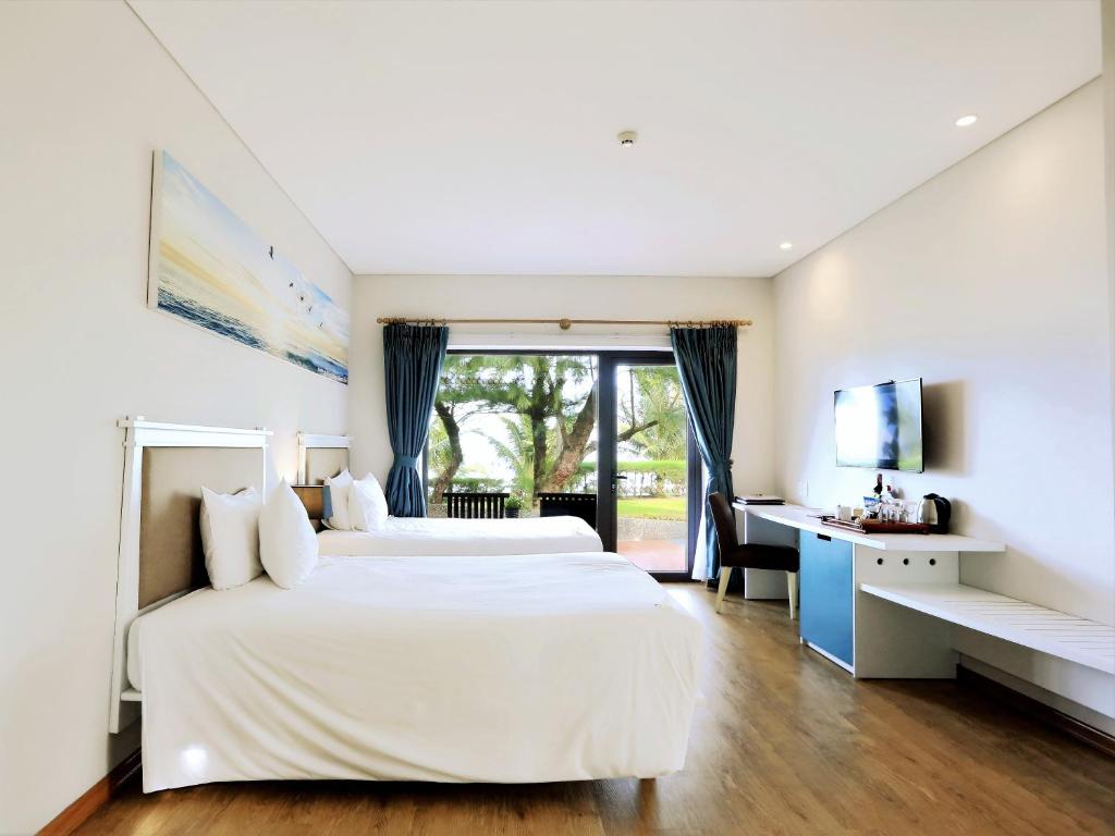 Номер (Бунгало с видом на океан) курортного отеля Centara Sandy Beach Resort Danang, Дананг