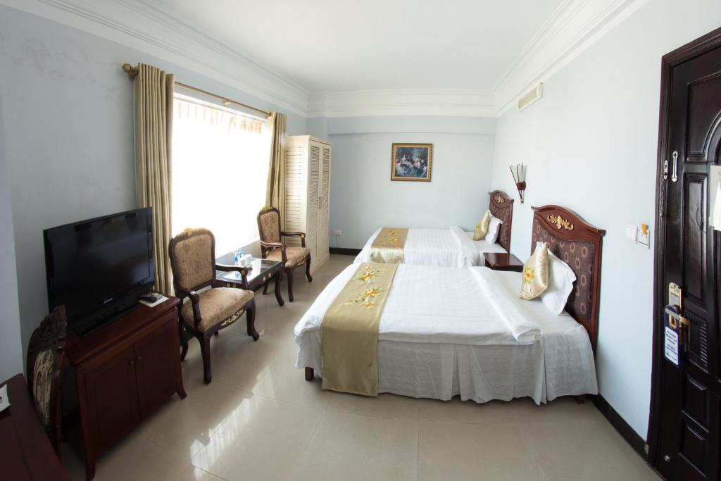 Двухместный (Улучшенный двухместный номер с 2 отдельными кроватями) отеля Classic Hoang Long Hotel, Хайфон