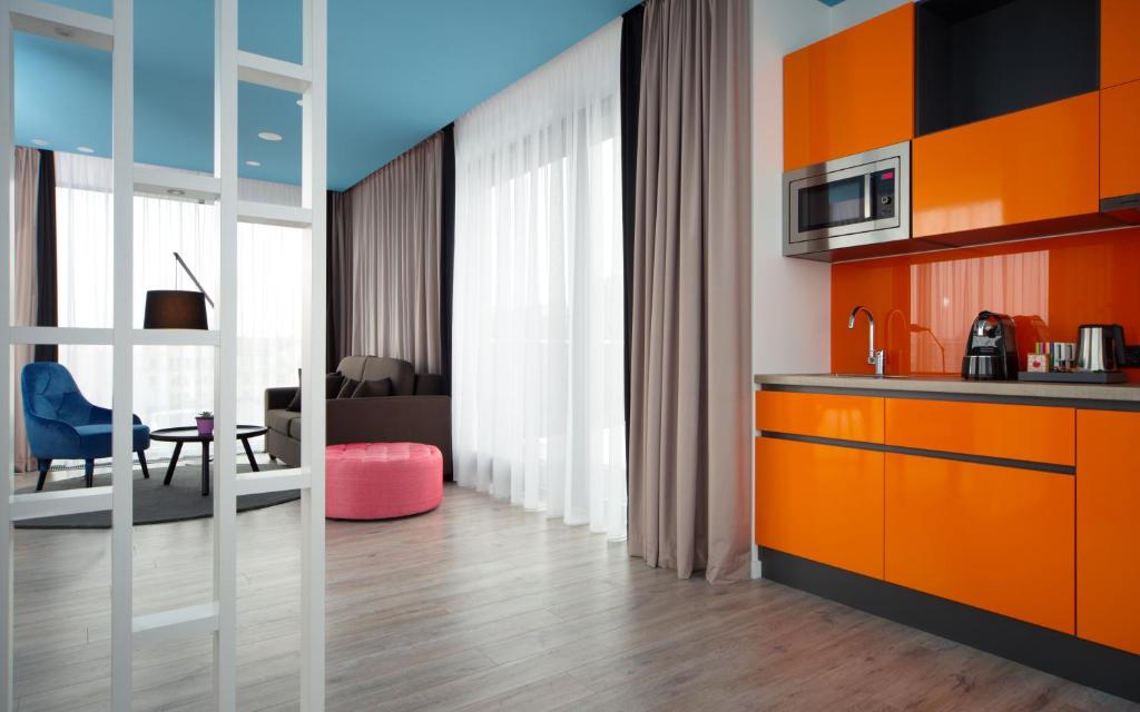 Апартаменты (Улучшенные апартаменты с 1 спальней и террасой) апарт-отеля Park Inn by Radisson Residence Riga Barona, Рига