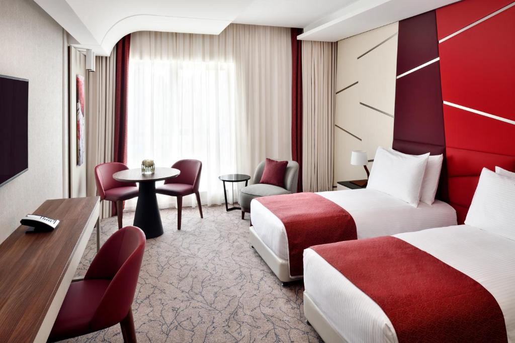 Двухместный (Двухместный номер Делюкс с 2 отдельными кроватями) апарт-отеля Mövenpick Hotel Apartments Downtown Dubai, Дубай