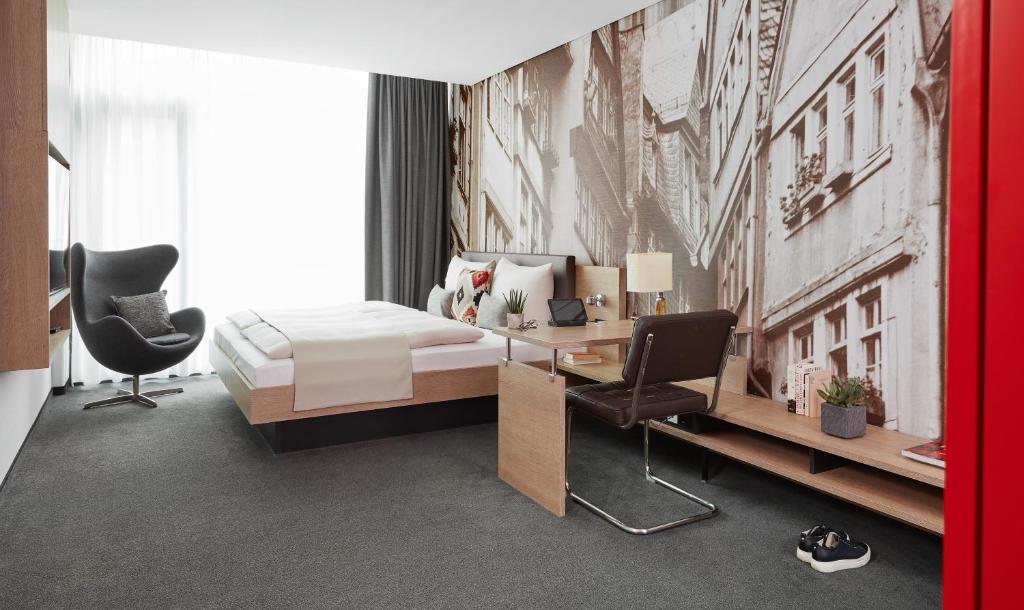 Апартаменты (Двухместные апартаменты Делюкс с 1 кроватью) апарт-отеля Derag Livinghotel Frankfurt, Франкфурт-на-Майне