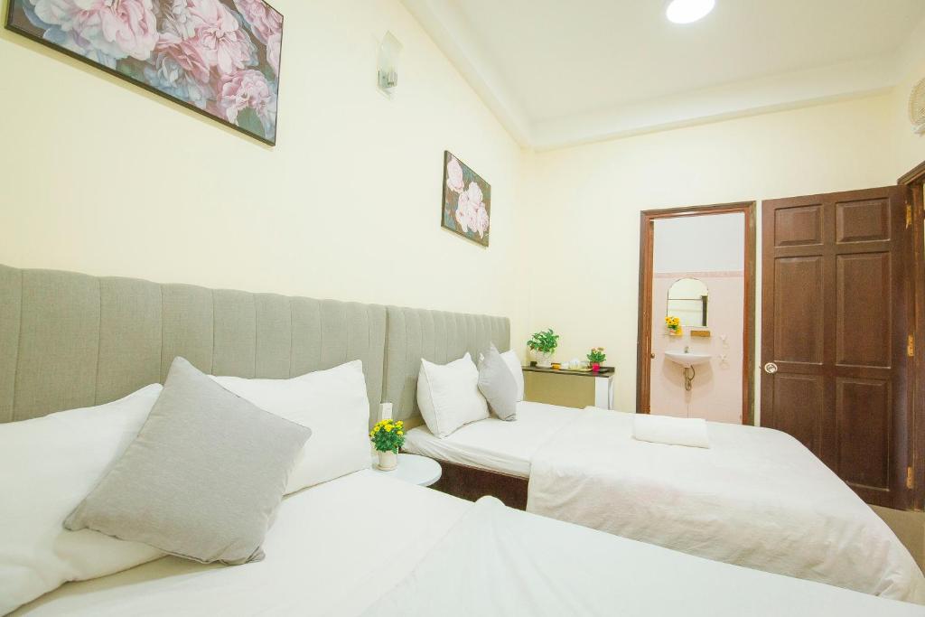Двухместный (Двухместный номер с 2 отдельными кроватями и душем) отеля Thang Lap Hotel, Далат