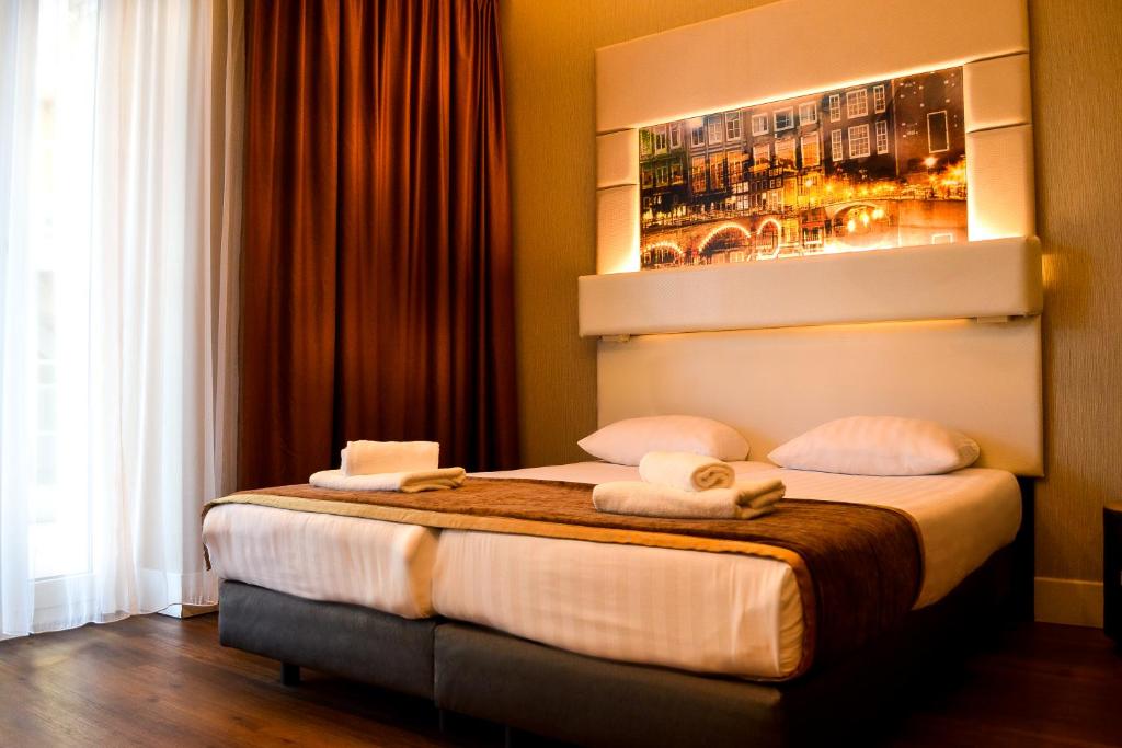 Двухместный (Двухместный номер с 2 отдельными кроватями и балконом) отеля Hotel Mosaic City Centre, Амстердам