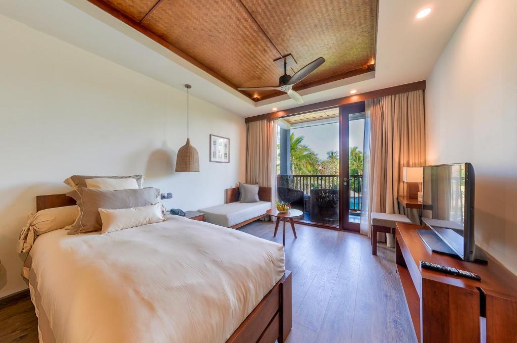 Двухместный (Двухместный номер Делюкс с 1 кроватью или 2 отдельными кроватями) курортного отеля Hoi An Eco Lodge & Spa, Хойан