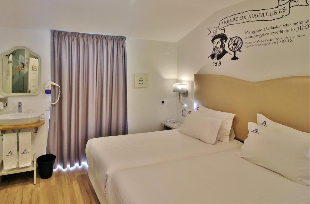 Двухместный (Двухместный номер с 2 отдельными кроватями и балконом) отеля Villa Ana Margarida Hotel, Эрисейра