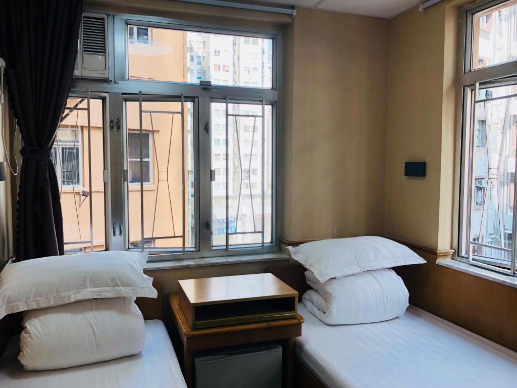 Двухместный (Двухместный номер с 1 кроватью или 2 отдельными кроватями и ванной комнатой) гостевого дома Good Fortune Inn (South and North), Гонконг (город)