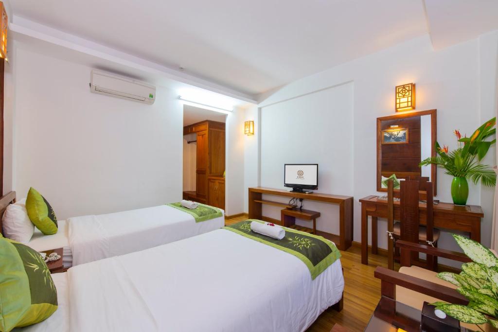 Двухместный (Улучшенный двухместный номер с 2 отдельными кроватями) отеля Kiman Hotel, Хойан