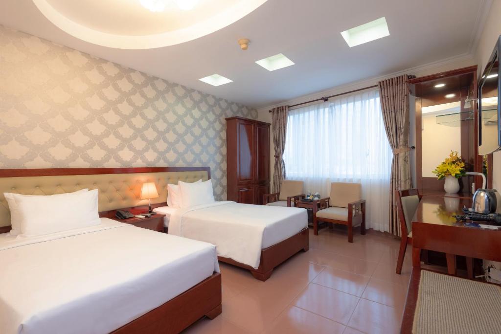 Двухместный (Двухместный номер Делюкс с 2 отдельными кроватями) отеля Thien Xuan Hotel, Хошимин
