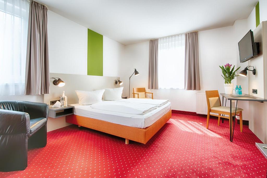Двухместный (Улучшенный номер с кроватью размера «queen-size») отеля ACHAT Comfort Messe-Chemnitz, Хемниц