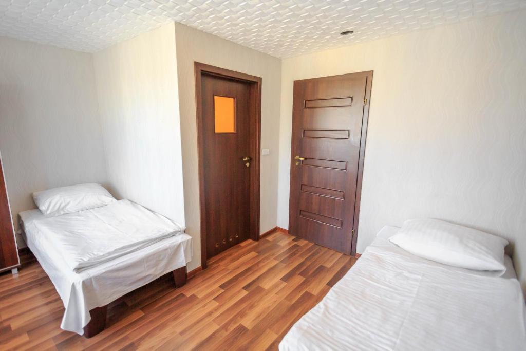 Двухместный (Стандартный двухместный номер с 2 отдельными кроватями) семейного отеля Villavida, Познань