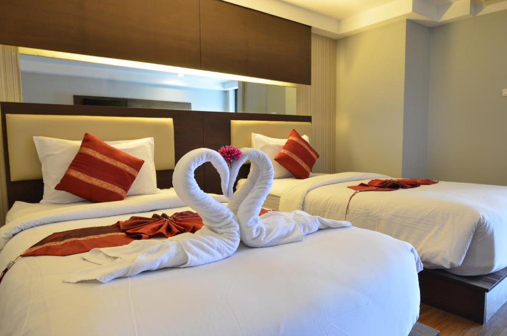 Двухместный (Двухместный номер Делюкс с 2 отдельными кроватями) отеля Tara Garden, Бангкок