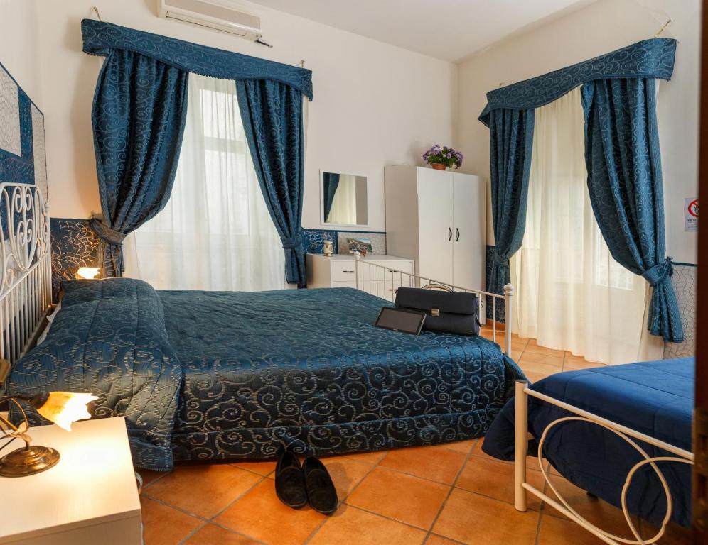 Трехместный (Стандартный трехместный номер) апарт-отеля Residence Confalone, Неаполь