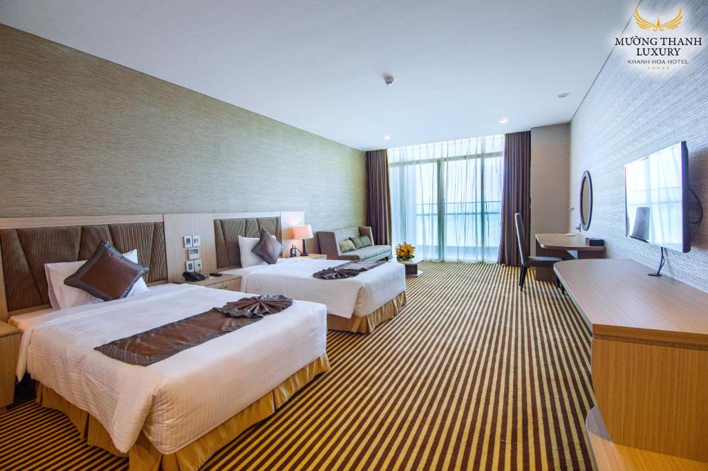 Трехместный (Трехместный номер Делюкс с видом на море) отеля Muong Thanh Luxury Khanh Hoa, Нячанг