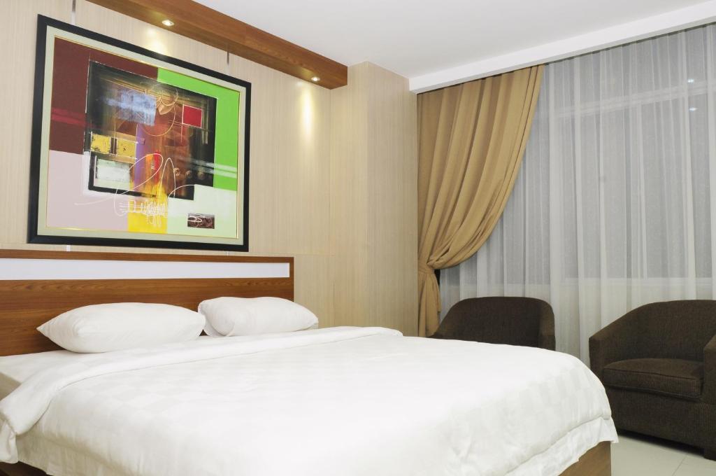 Двухместный (Двухместный номер Делюкс с 1 кроватью) отеля Graha SUMSEL, Джакарта