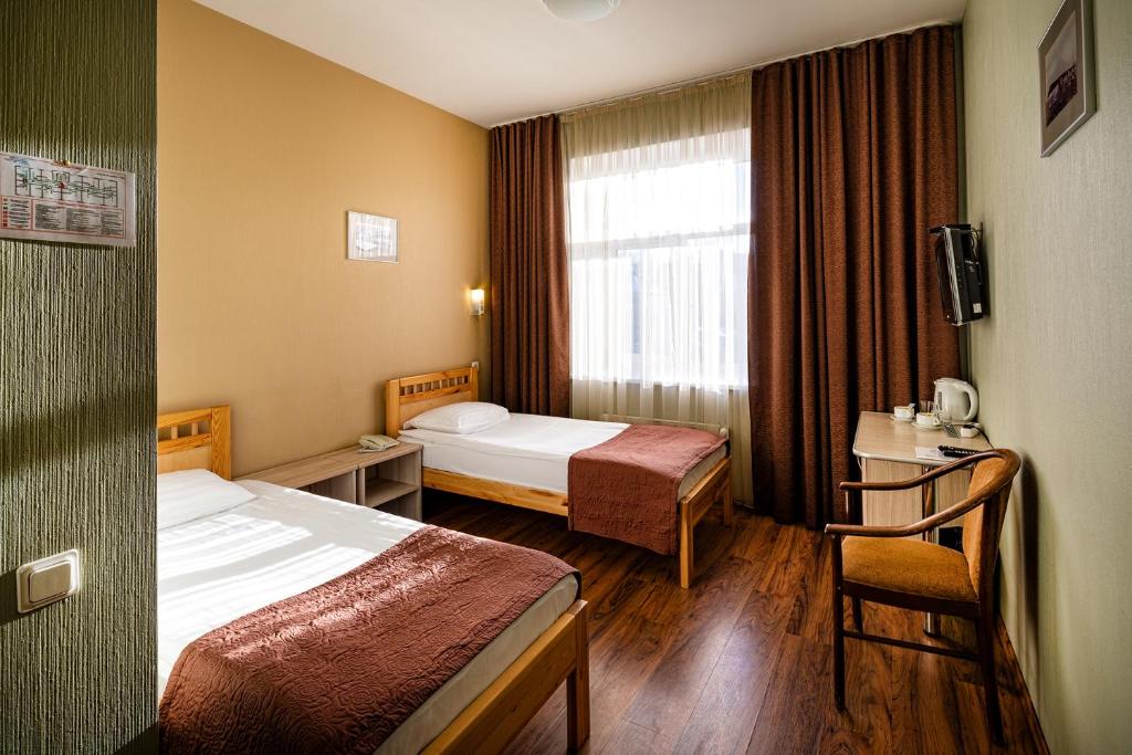 Двухместный (Стандартный двухместный номер с 2 отдельными кроватями) отеля Biplan Hotel, Даугавпилс