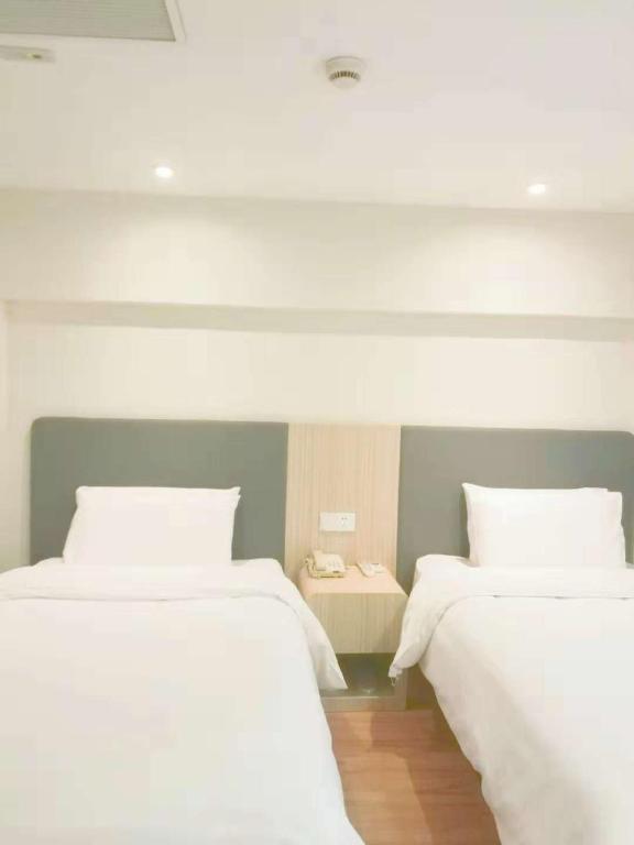 Двухместный (Двухместный номер с 2 отдельными кроватями) отеля Hanting Express Shanghai Hongkou Football Stadium, Шанхай