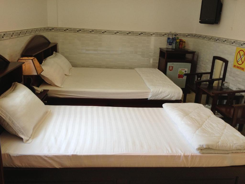 Двухместный (Улучшенный двухместный номер с 2 отдельными кроватями) отеля Huynh Lac Can Tho Hotel, Кантхо