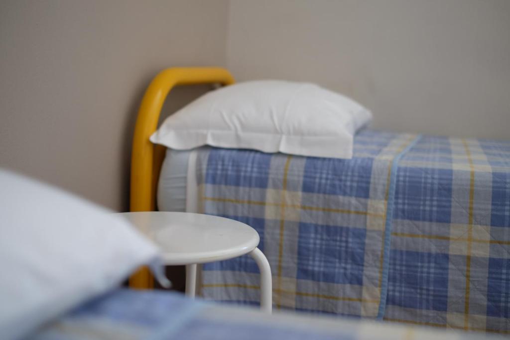 Номер (Кровать в общем номере для мужчин с 4 кроватями) хостела Ostello di Bergamo, Бергамо