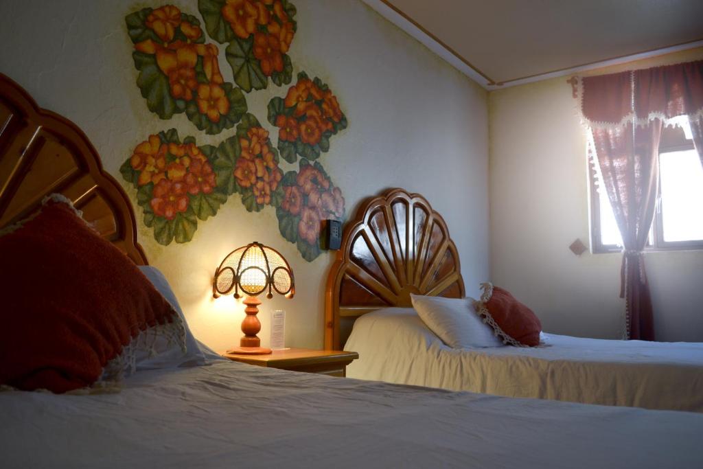 Двухместный (Двухместный номер с 2 двуспальными кроватями) отеля Hotel Feregrino, Берналь