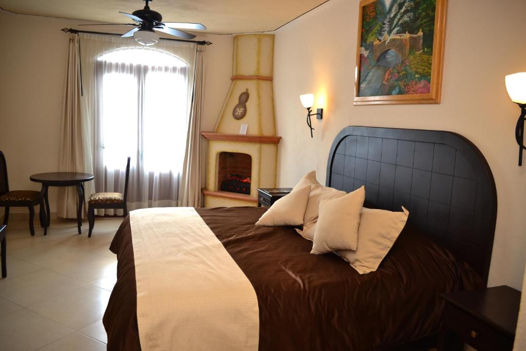 Двухместный (Представительский номер с кроватью размера «king-size») отеля Hotel Feregrino, Берналь