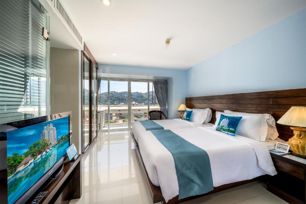 Сьюит (Люкс, вид на море) курортного отеля Andaman Beach Suites, Пхукет