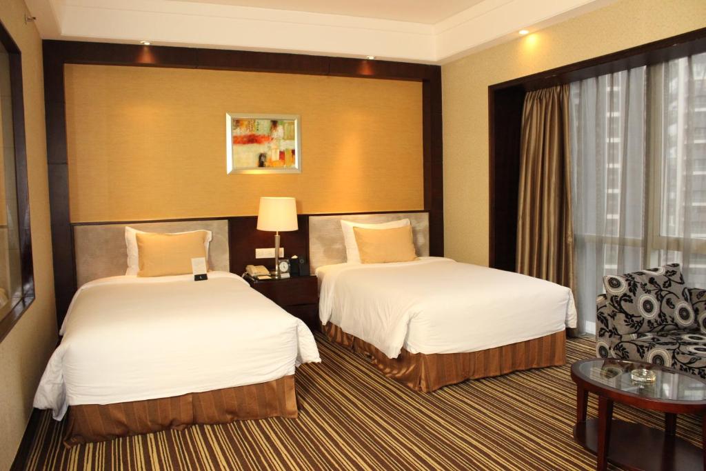 Двухместный (Представительский двухместный номер с 2 отдельными кроватями) отеля Leeden Hotel Guangzhou, Гуанчжоу
