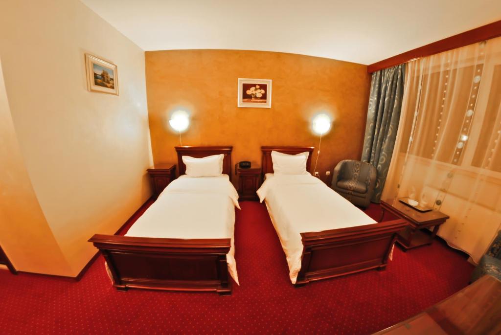 Двухместный (Стандартный двухместный номер с 2 отдельными кроватями) отеля Hotel Bavaria, Крайова