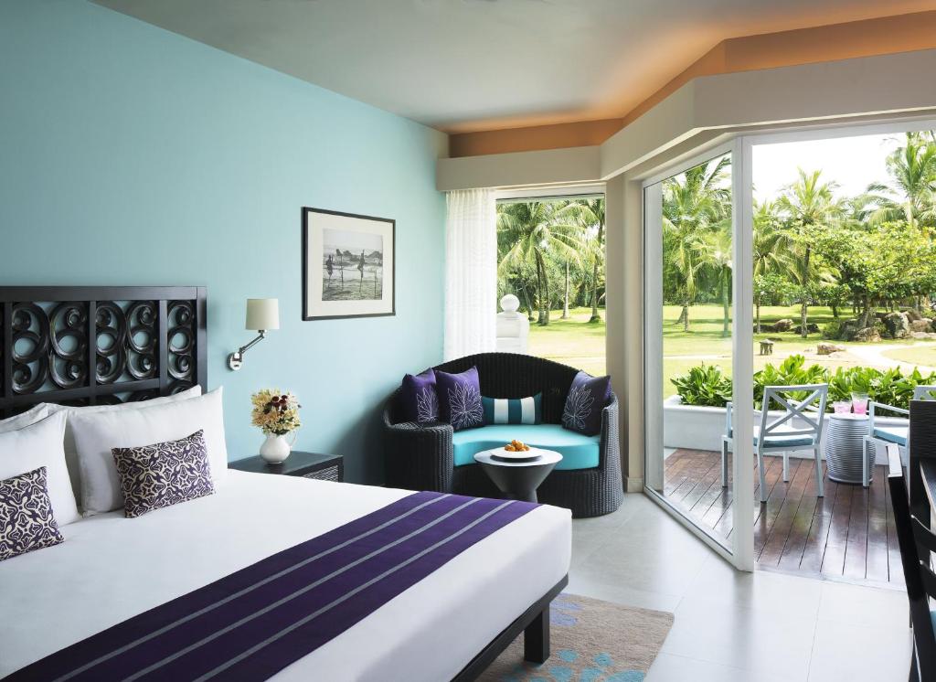 Трехместный (Двухместный номер Делюкс с 2 отдельными кроватями и видом на сад) курортного отеля Vivanta by Taj Bentota, Бентота