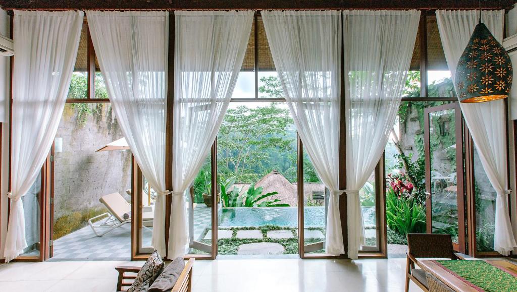 Сьюит (Two-Bedroom Personal Plunge Pool Villa) курортного отеля Tejaprana Resort & Spa, Убуд