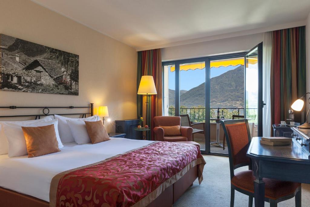Двухместный (Улучшенный двухместный номер с 1 кроватью и видом на озеро) отеля Boutique-Hotel Remorino, Локарно