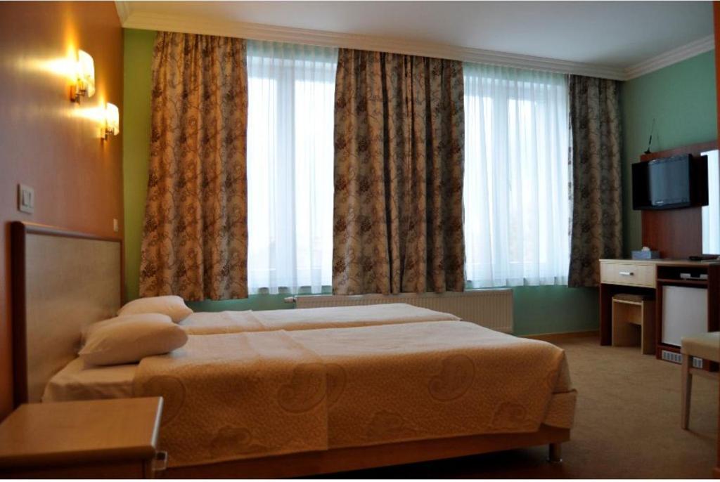 Двухместный (Двухместный номер с 2 отдельными кроватями) отеля Hotel Prestige, Брюссель