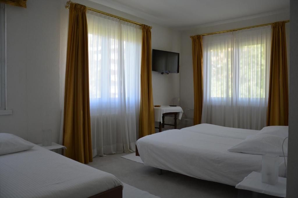 Трехместный (Трехместный номер) отеля Hotel Villa Selva, Лугано