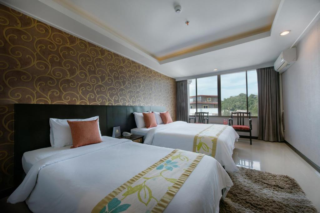 Двухместный (Улучшенный двухместный номер с 1 кроватью или 2 отдельными кроватями) отеля The Singora, Сонгхла