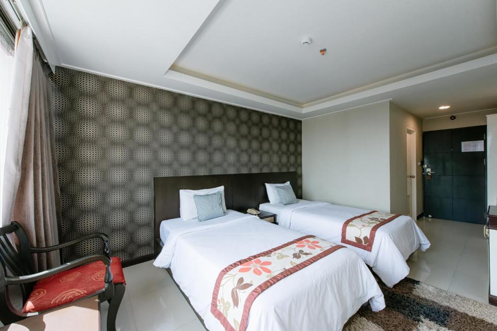Двухместный (Стандартный двухместный номер с 2 отдельными кроватями) отеля The Singora, Сонгхла