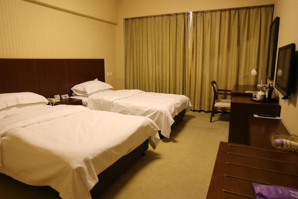 Двухместный (Стандарт номер Твин бизнес-класса) отеля Dalian Royal Hotel, Далянь
