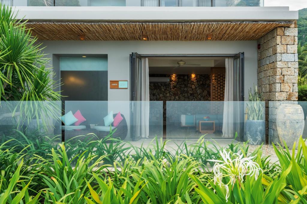 Двухместный (Двухместный номер с 2 отдельными кроватями - В кондоминиуме с видом на сад) курортного отеля Mia Resort Nha Trang, Нячанг