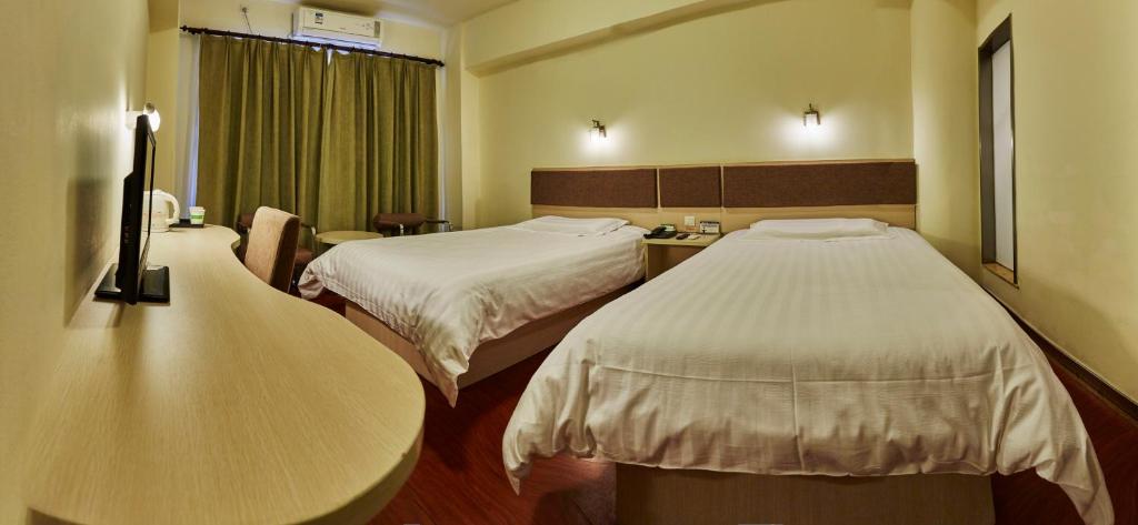 Двухместный (Специальное предложение - Двухместный номер с 2 отдельными кроватями) отеля Motel Shanghai Pudong Jinqiao Jin'gao Road, Шанхай