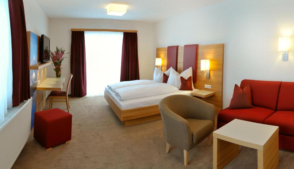 Двухместный (Улучшенный двухместный номер с 1 кроватью) отеля Hotel Sonnschupfer, Шладминг