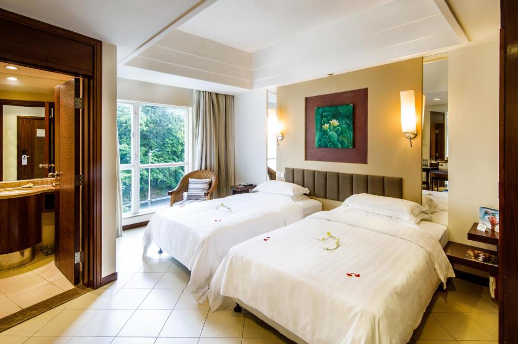 Двухместный (Стандартный двухместный номер с 1 кроватью или 2 отдельными кроватями) курортного отеля Cactus Resort Sanya by Gloria, Санья