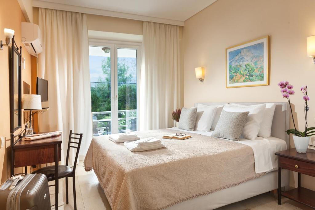 Двухместный (Двухместный номер с 1 кроватью или 2 отдельными кроватями) отеля Minavra Hotel, Афины