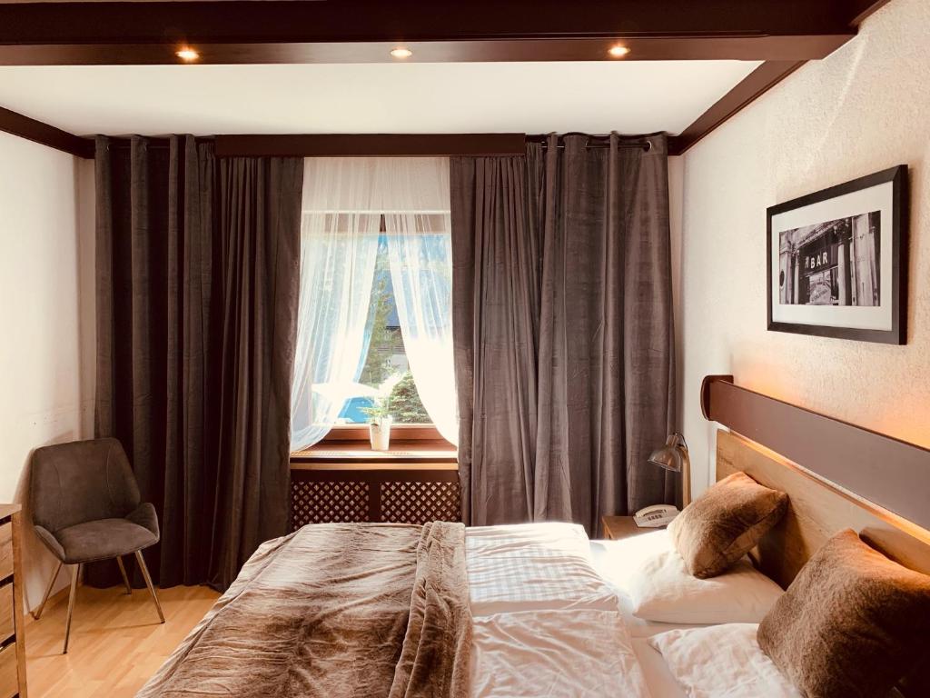 Двухместный (Двухместный номер Делюкс с 1 кроватью и дополнительной кроватью) отеля Gasthof Draxlerhaus, Хоэнтауэрн