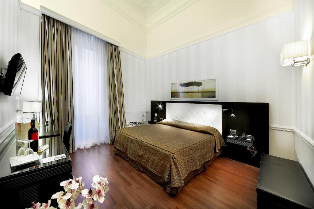 Двухместный (Улучшенный двухместный номер с 1 кроватью или 2 отдельными кроватями) отеля Il Principe Hotel Catania, Катания