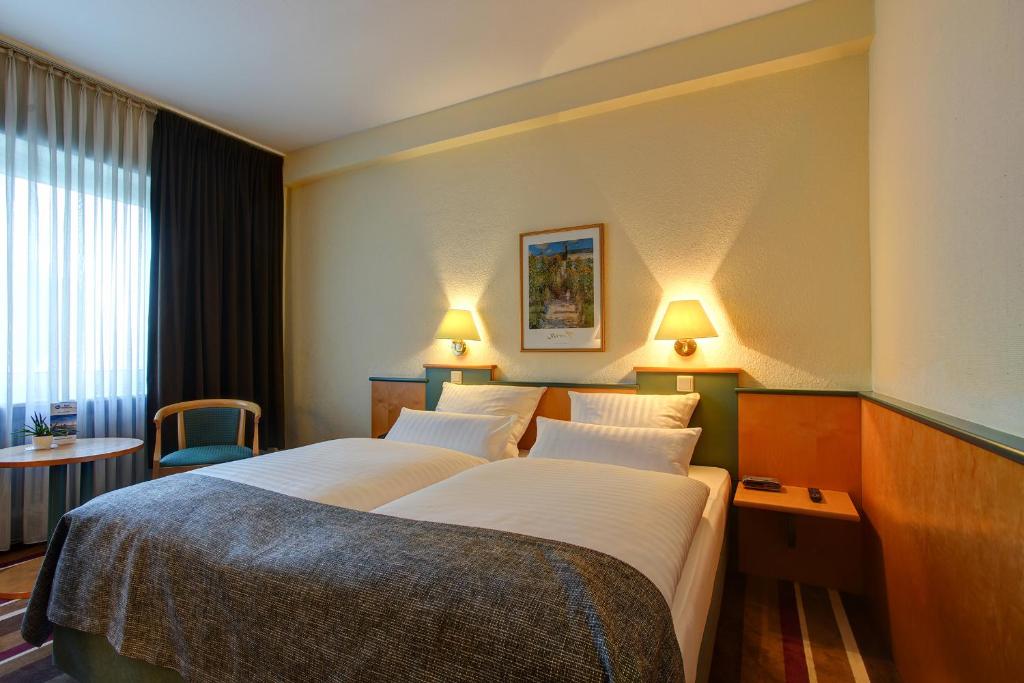 Двухместный (Стандартный двухместный номер с 2 отдельными кроватями) отеля Best Western Ambassador Hotel, Дюссельдорф