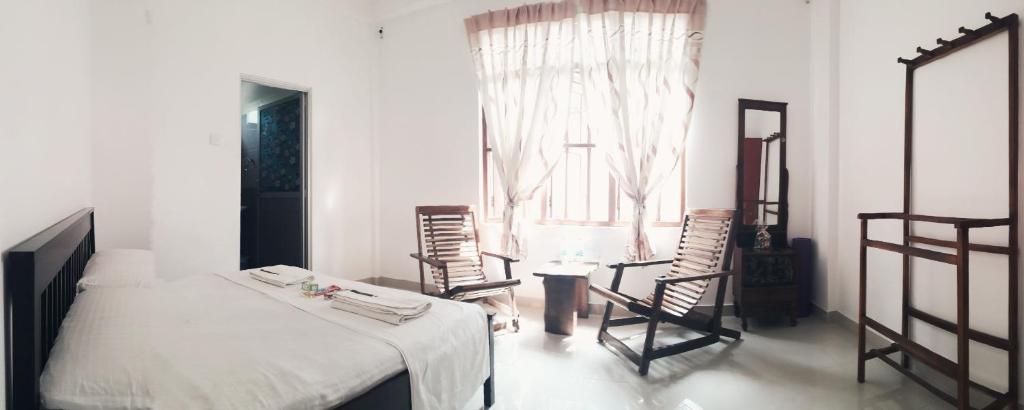 Двухместный (Двухместный номер с 1 кроватью, вид на сад) семейного отеля Kadupul Villa, Велигама