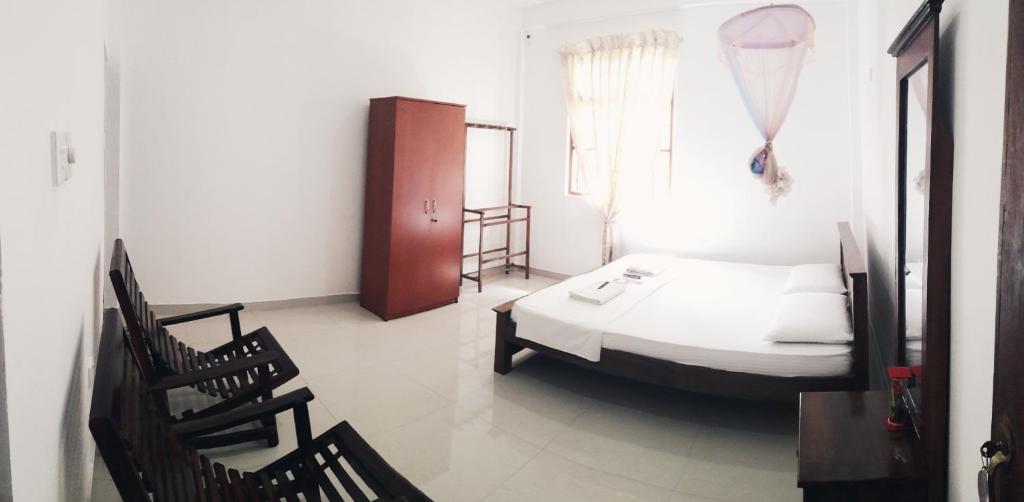 Двухместный (Двухместный номер с 1 кроватью, вид на сад) семейного отеля Kadupul Villa, Велигама