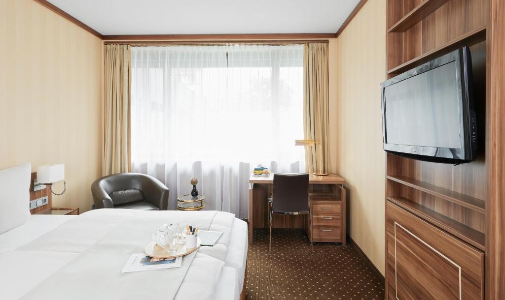 Двухместный (Двухместный номер «Бизнес Плюс» с 1 кроватью или 2 отдельными кроватями) апарт-отеля Derag Livinghotel Düsseldorf, Дюссельдорф