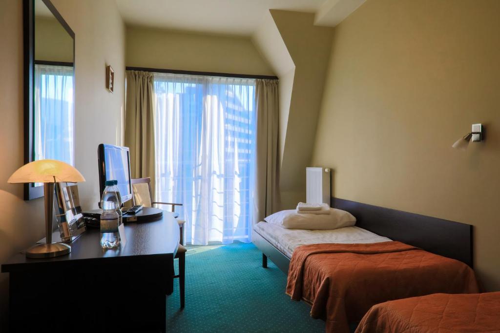 Двухместный (Двухместный номер с 2 отдельными кроватями) отеля Hotel Ziemowit, Устронь