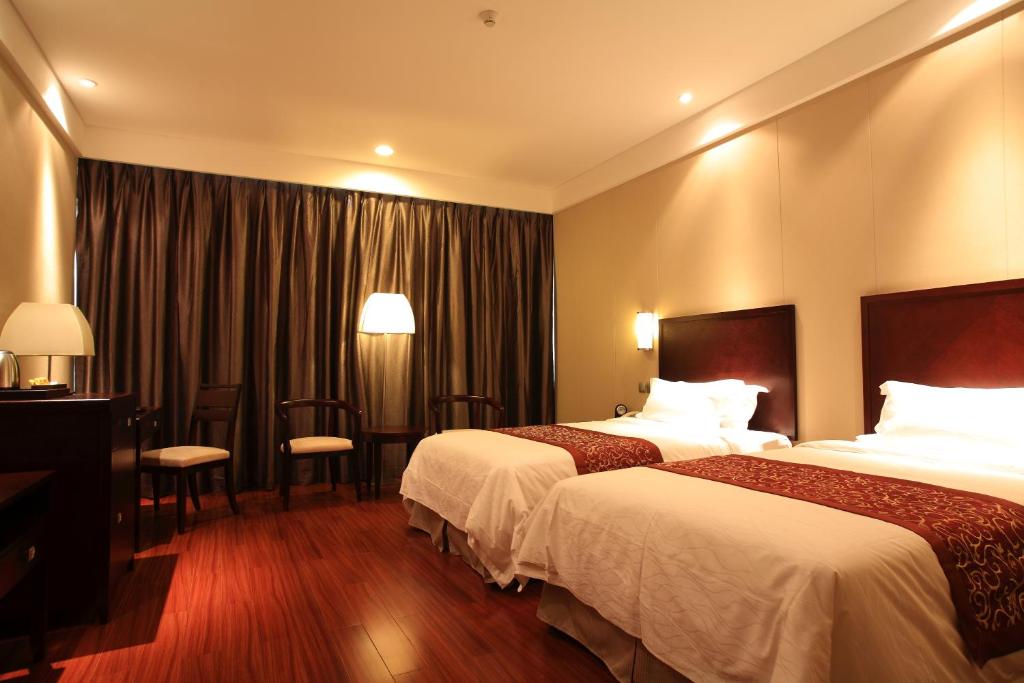 Двухместный (Deluxe Twin Bed Non Smoking Room) отеля Ramada Suzhou Luzhi, Сучжоу