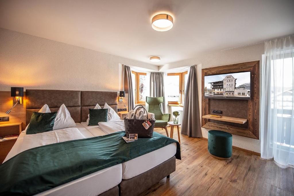 Двухместный (Улучшенный двухместный номер с 1 кроватью) отеля Hotel Bergland Top Quality - Все включено, Зефельд-ин-Тироль